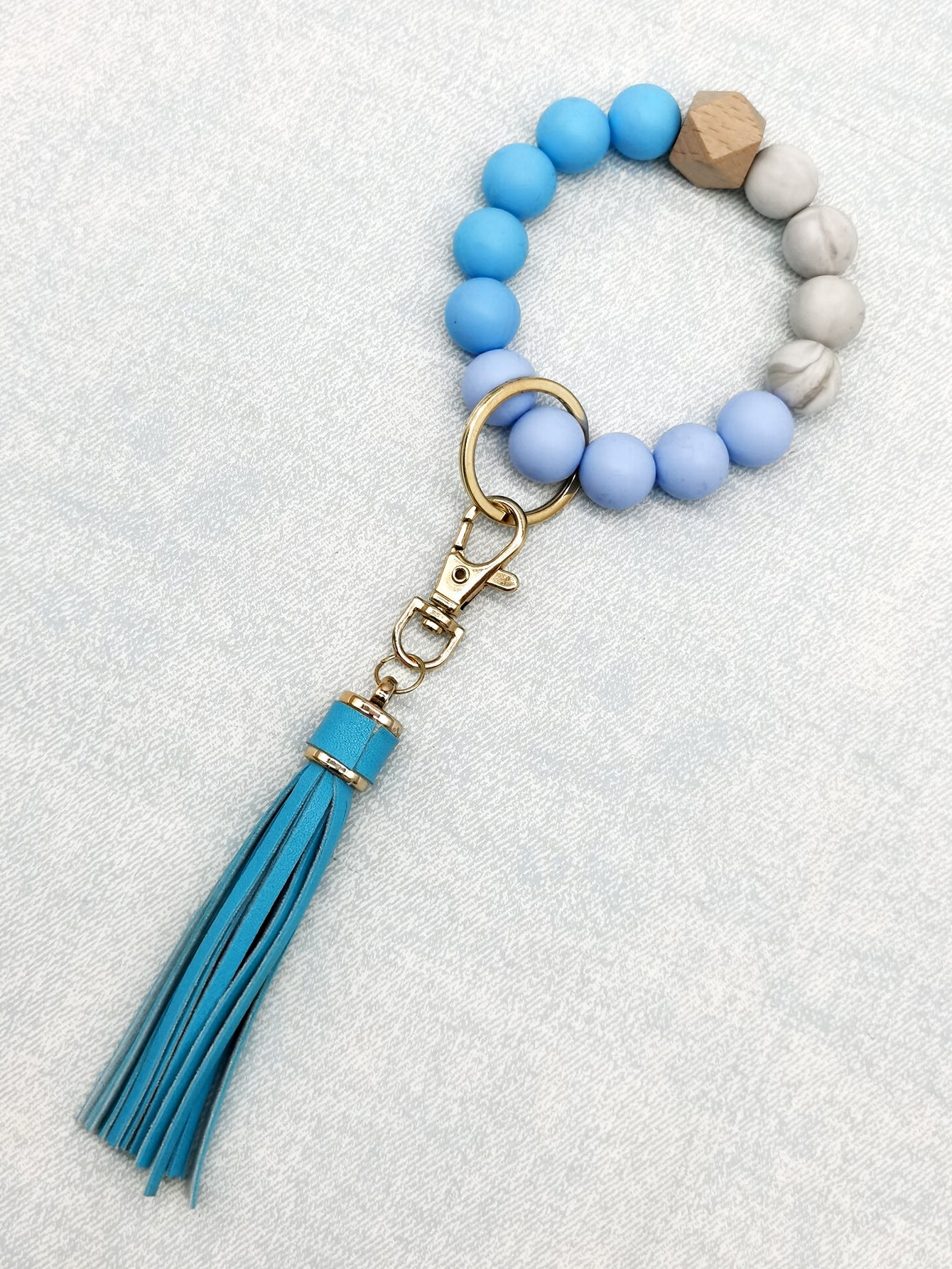 Pulsera de cuentas de silicona con borlas al por mayor llavero de muñeca